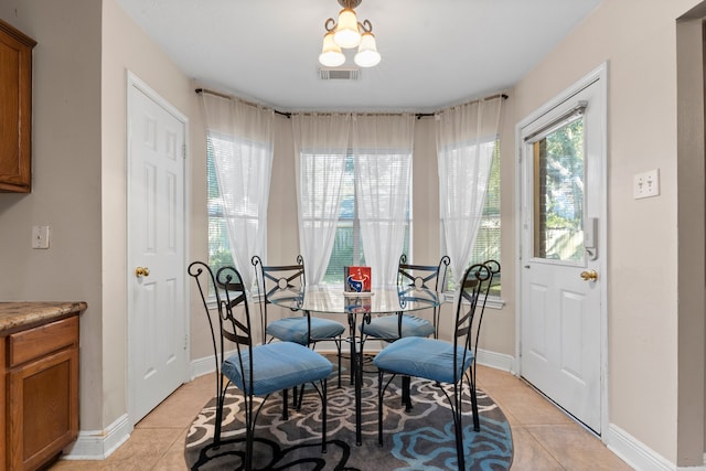 dining room with light tile patterned floors