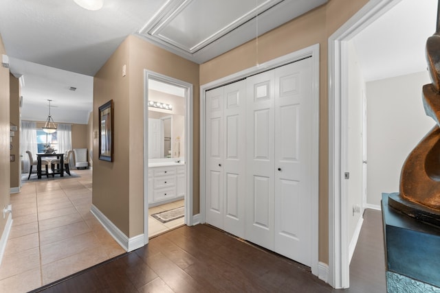 hallway with wood-type flooring