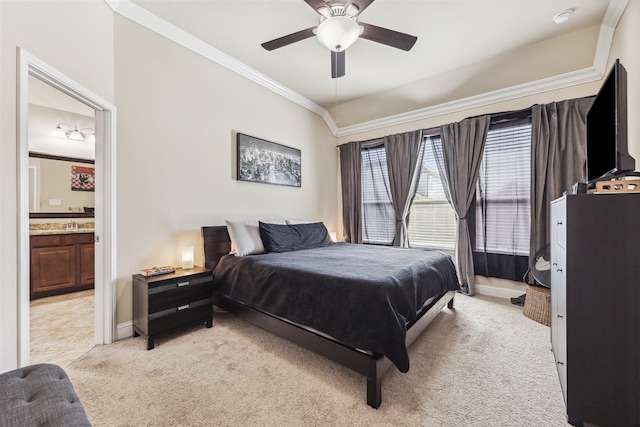 carpeted bedroom with connected bathroom, ceiling fan, and crown molding