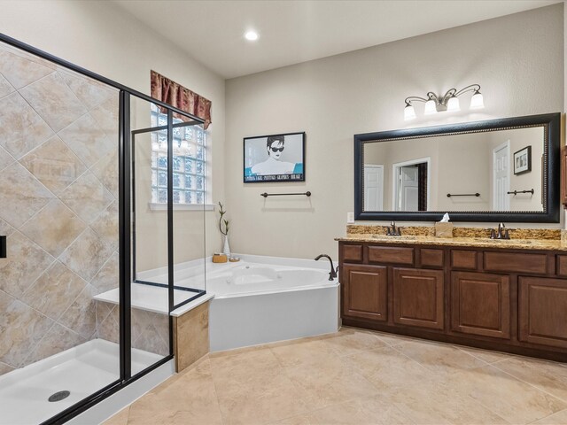 bathroom featuring vanity, shower with separate bathtub, and tile patterned flooring