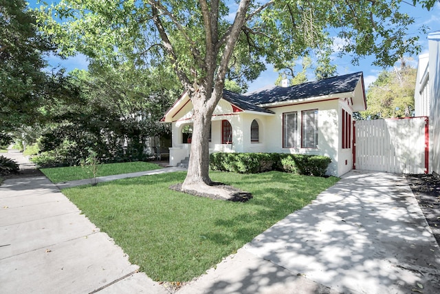 view of front of home with a front yard