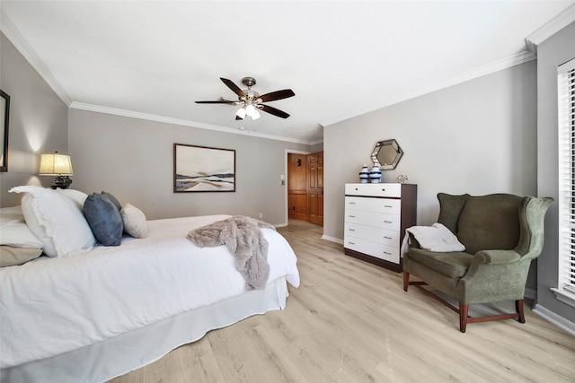 bedroom featuring light hardwood / wood-style floors, ceiling fan, and ornamental molding