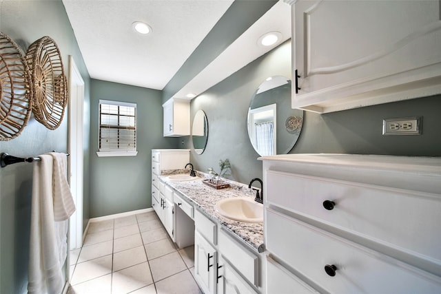 bathroom featuring vanity and tile patterned floors