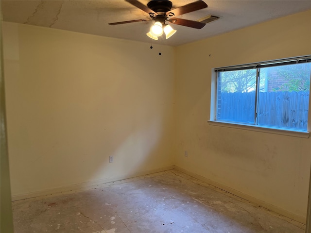 unfurnished room with ceiling fan