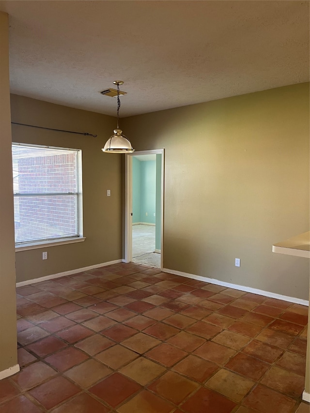 view of tiled empty room