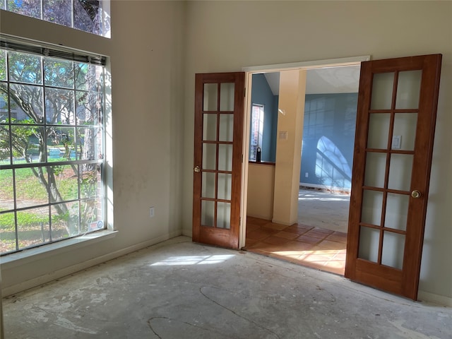 entryway featuring french doors and plenty of natural light