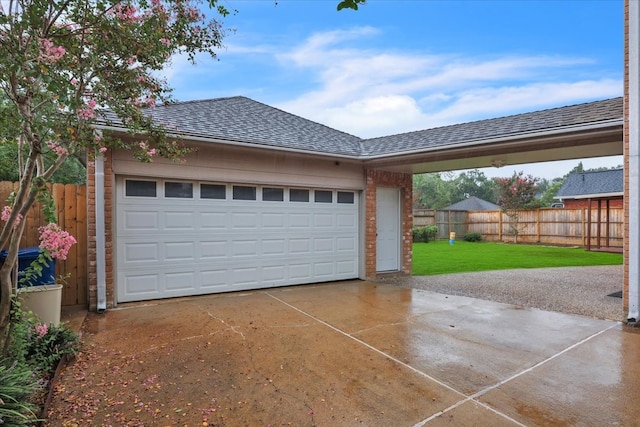 garage with a lawn