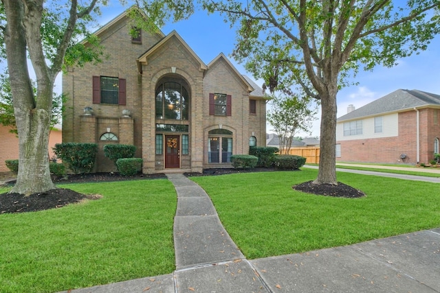 view of front of home with a front yard