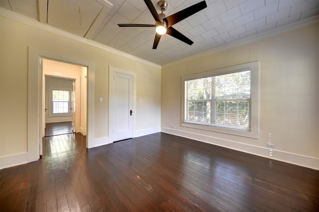 unfurnished room with a healthy amount of sunlight, ornamental molding, dark hardwood / wood-style floors, and ceiling fan