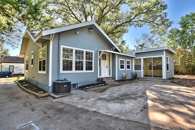 view of front of home with cooling unit