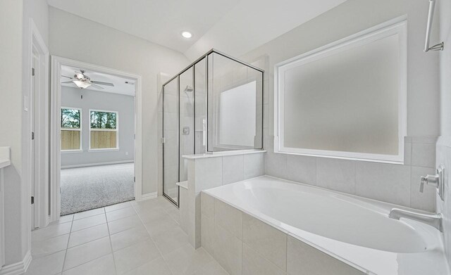 bathroom with separate shower and tub, tile patterned floors, and ceiling fan