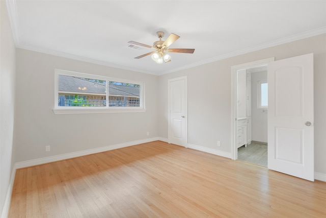 unfurnished bedroom featuring light wood-type flooring, ceiling fan, crown molding, and connected bathroom