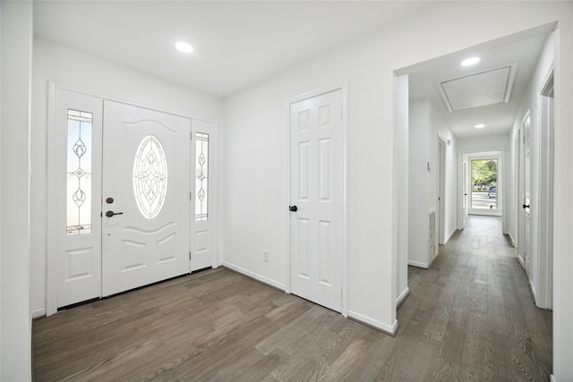 entrance foyer featuring dark hardwood / wood-style flooring