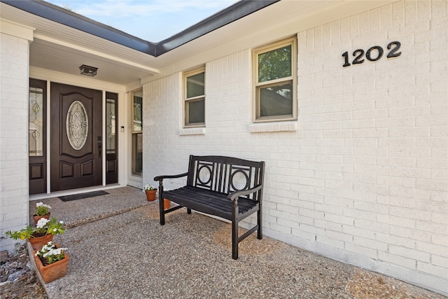 entrance to property with a porch