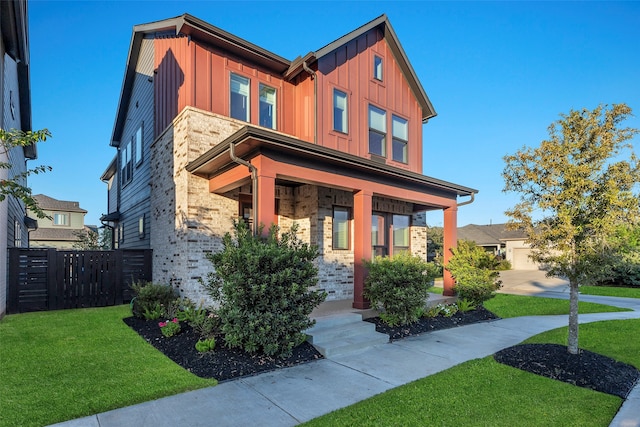 view of front of home with a front lawn