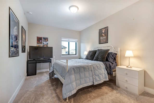 bedroom featuring carpet