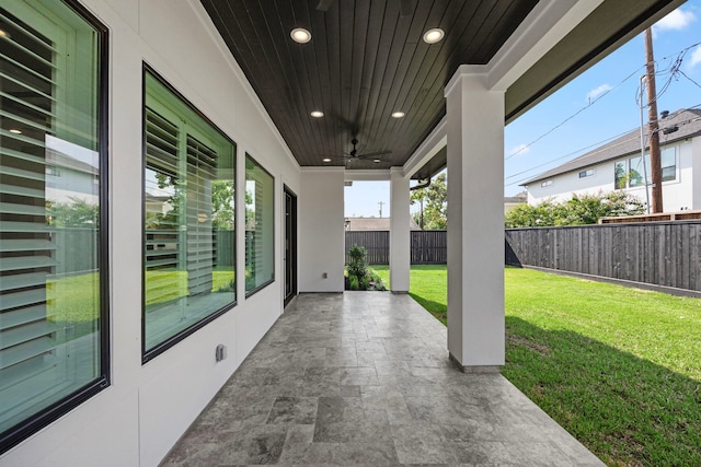 view of patio / terrace with fence private yard and ceiling fan