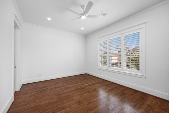 unfurnished room featuring dark wood-type flooring, ceiling fan, and crown molding