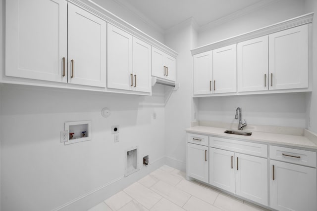 clothes washing area featuring cabinets, sink, ornamental molding, hookup for an electric dryer, and hookup for a washing machine