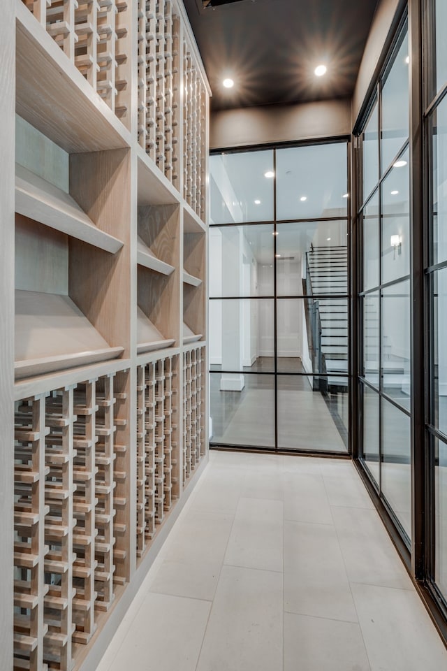 wine room featuring tile patterned floors