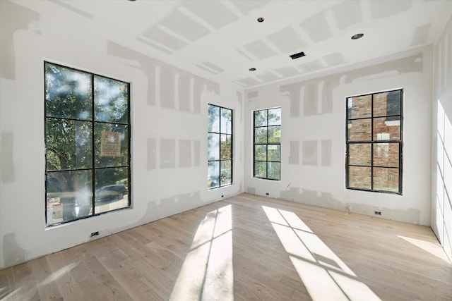 unfurnished room featuring light hardwood / wood-style flooring