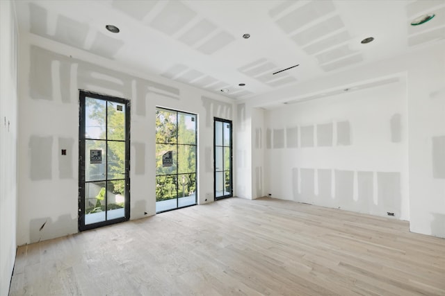 empty room with light wood-type flooring