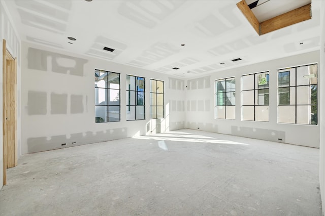 empty room featuring plenty of natural light