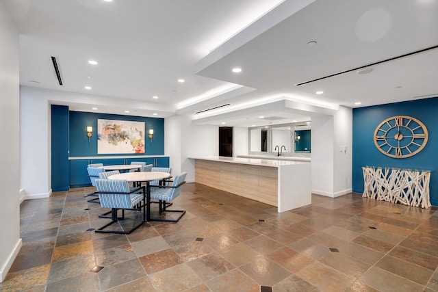 dining area featuring sink