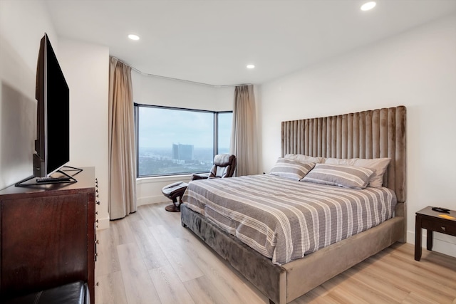 bedroom featuring light hardwood / wood-style floors