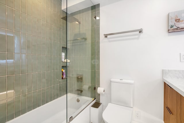 full bathroom with bath / shower combo with glass door, vanity, and toilet