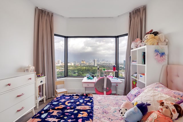 bedroom featuring wood-type flooring