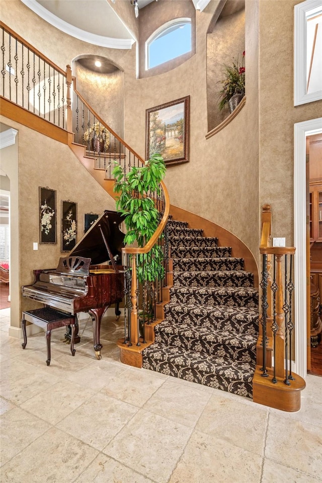 stairs with a high ceiling