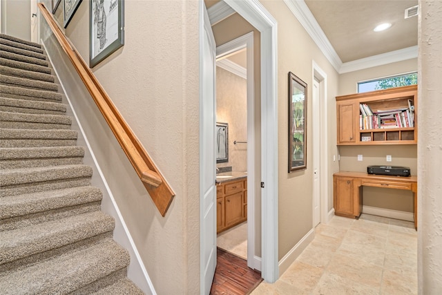 stairway with ornamental molding and sink