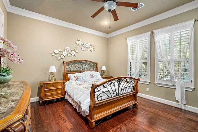 bedroom featuring ceiling fan, crown molding, and dark wood-type flooring