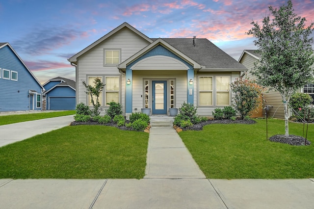 view of front of house featuring a lawn