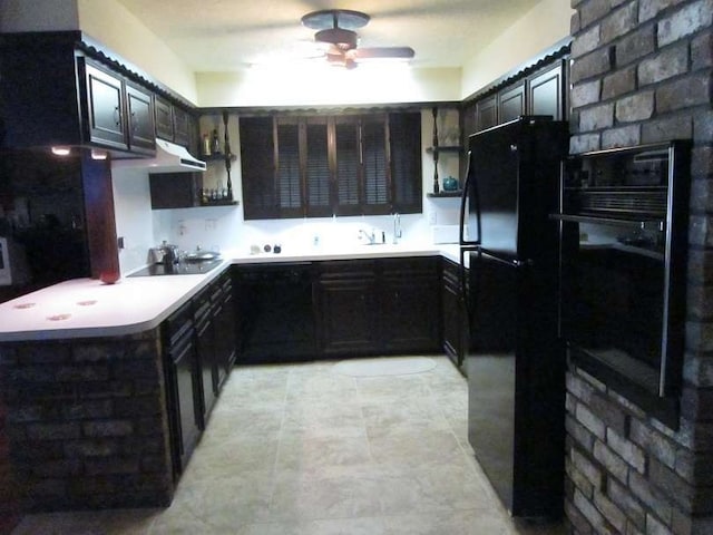 kitchen featuring dark brown cabinets, ceiling fan, and black appliances