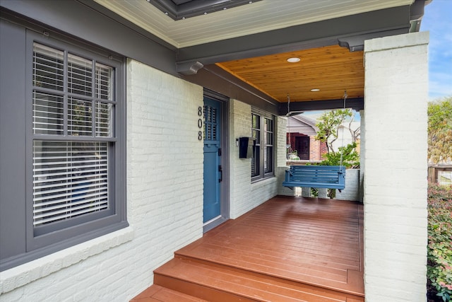 wooden deck featuring covered porch