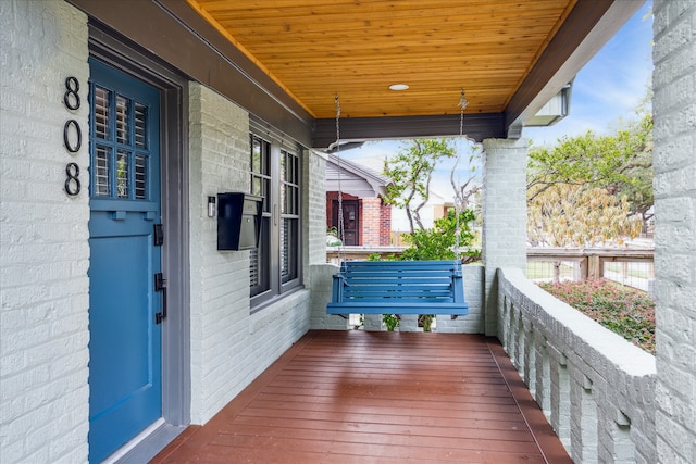 deck with covered porch