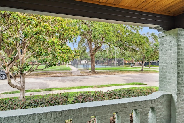 exterior space featuring tennis court