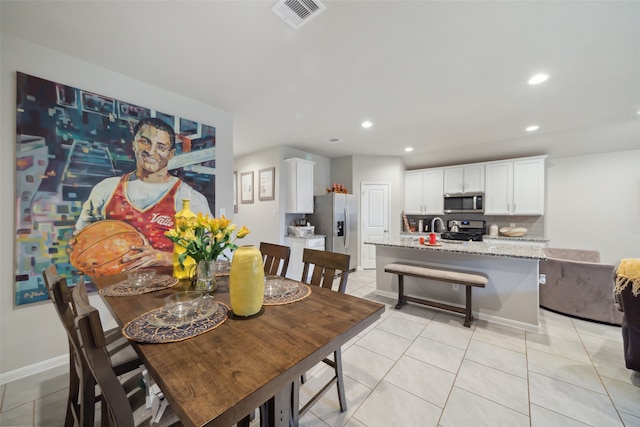 view of tiled dining space