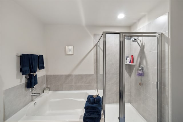 bathroom with independent shower and bath