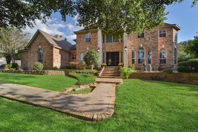 view of front facade with a front lawn