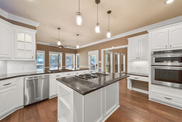 kitchen featuring white cabinetry, sink, and appliances with stainless steel finishes