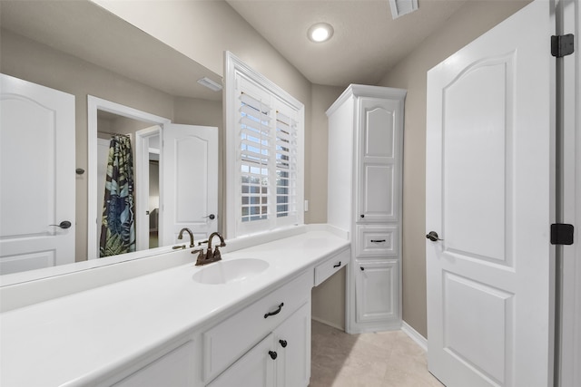 bathroom featuring vanity