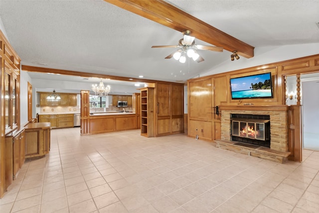 unfurnished living room with a fireplace, light tile patterned floors, lofted ceiling with beams, and ceiling fan with notable chandelier