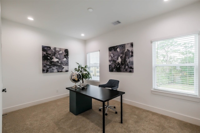 office space with light carpet