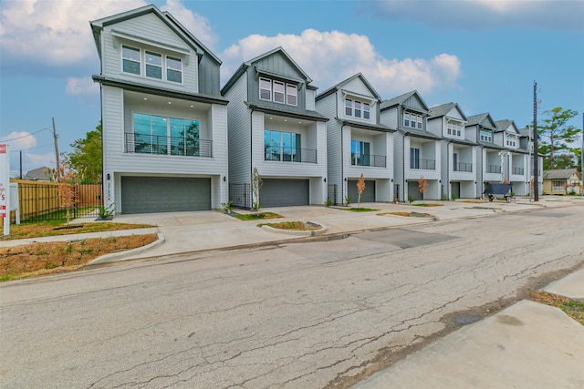 townhome / multi-family property featuring a garage