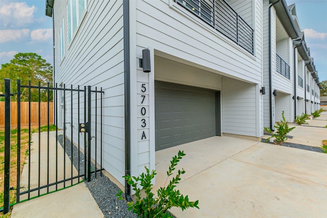 view of side of home featuring a garage