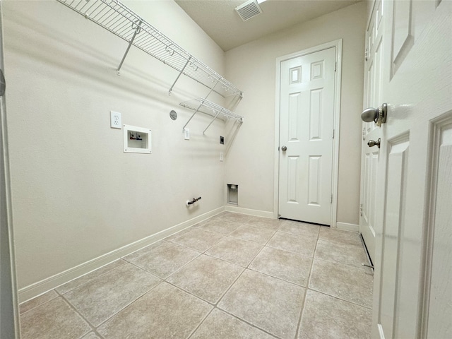 washroom with laundry area, light tile patterned floors, visible vents, hookup for a gas dryer, and hookup for a washing machine