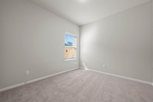 511 Emerald Thicket Ln, Huffman, TX 77336 - unfurnished room featuring baseboards and light colored carpet